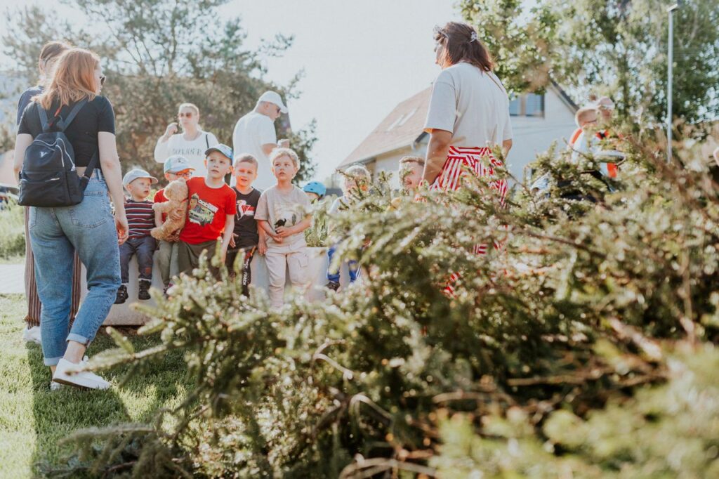 Mastering the First Impression: Your intriguing post title goes here Children and adults participating in an outdoor educational activity surrounded by nature.